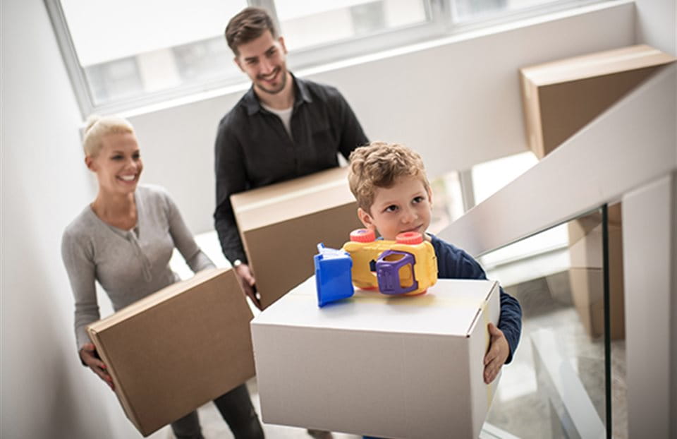  Family with moving boxes